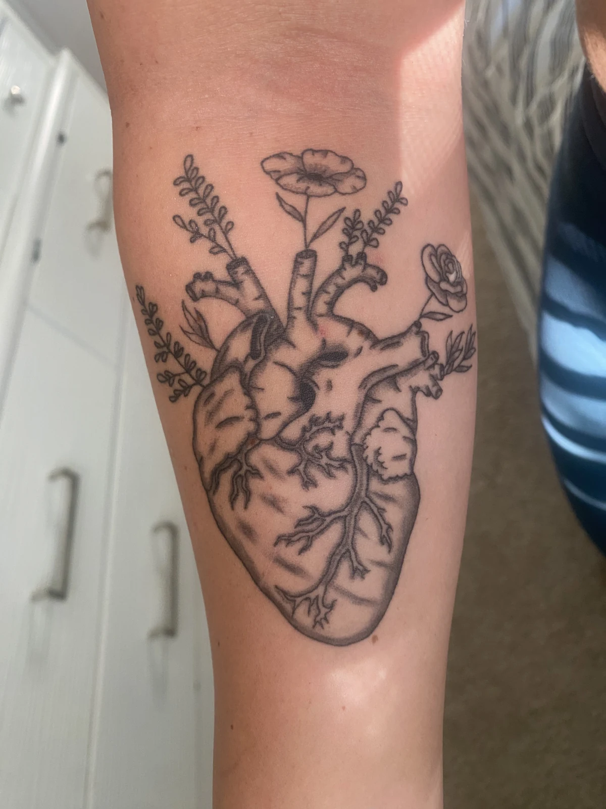 Healed botanical heart tattoo