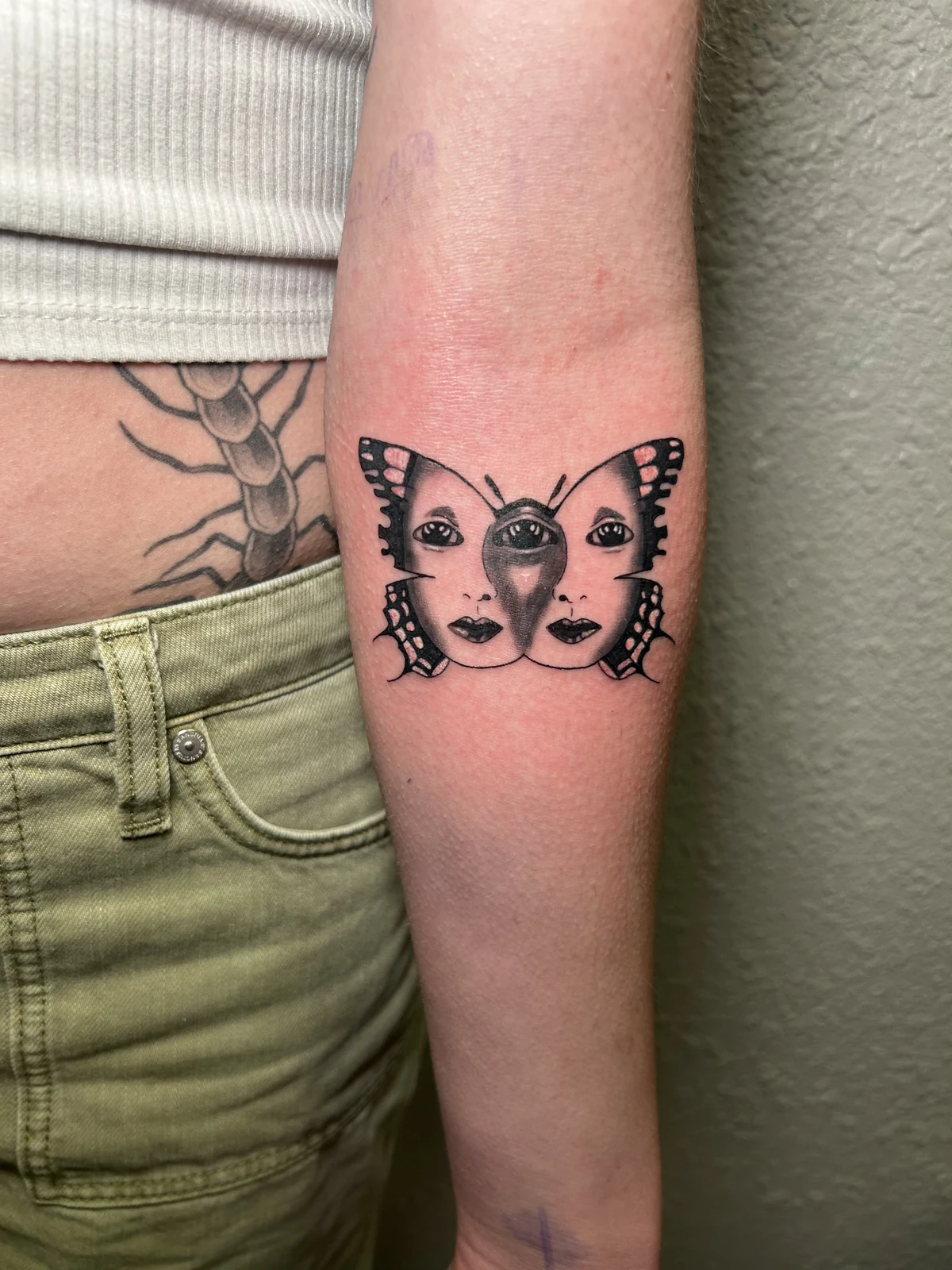 Fresh butterfly faces tattoo